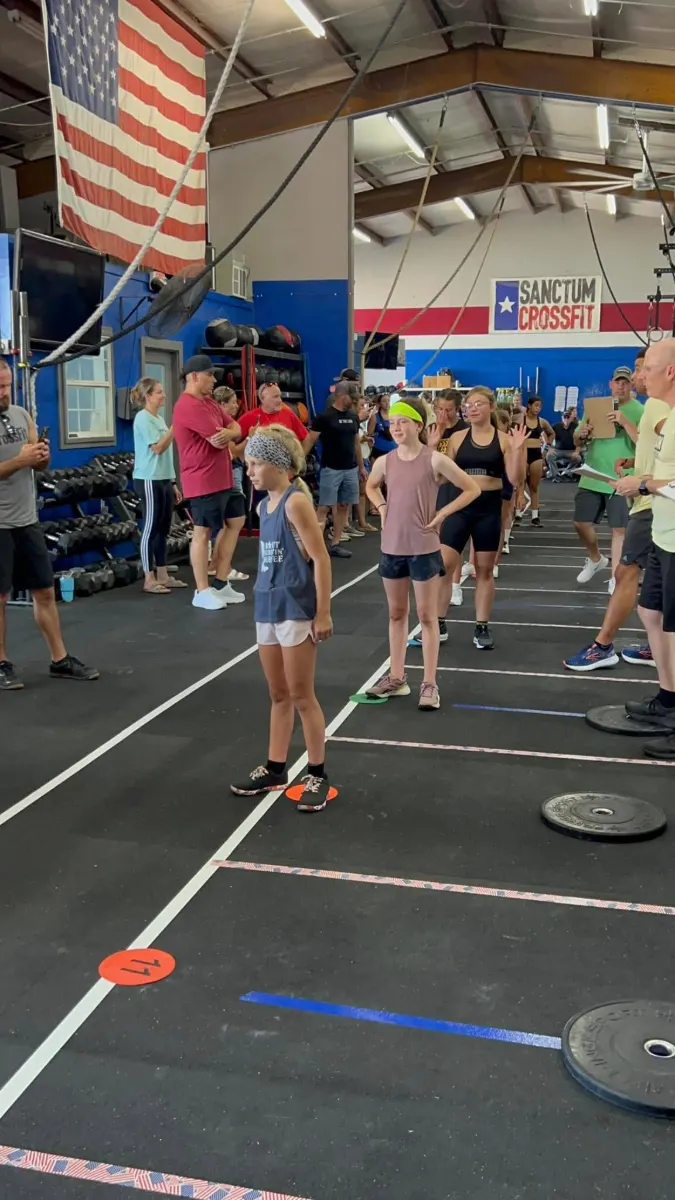 Athletes lined up at the start before a workout